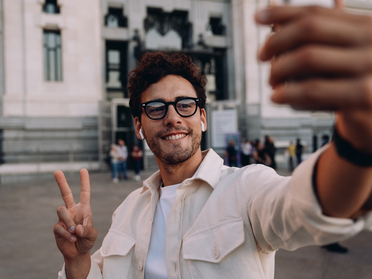 Travel creator taking selfie